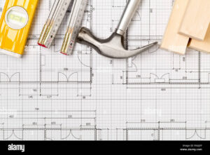 plano arquitectonico con herramientas de construccion